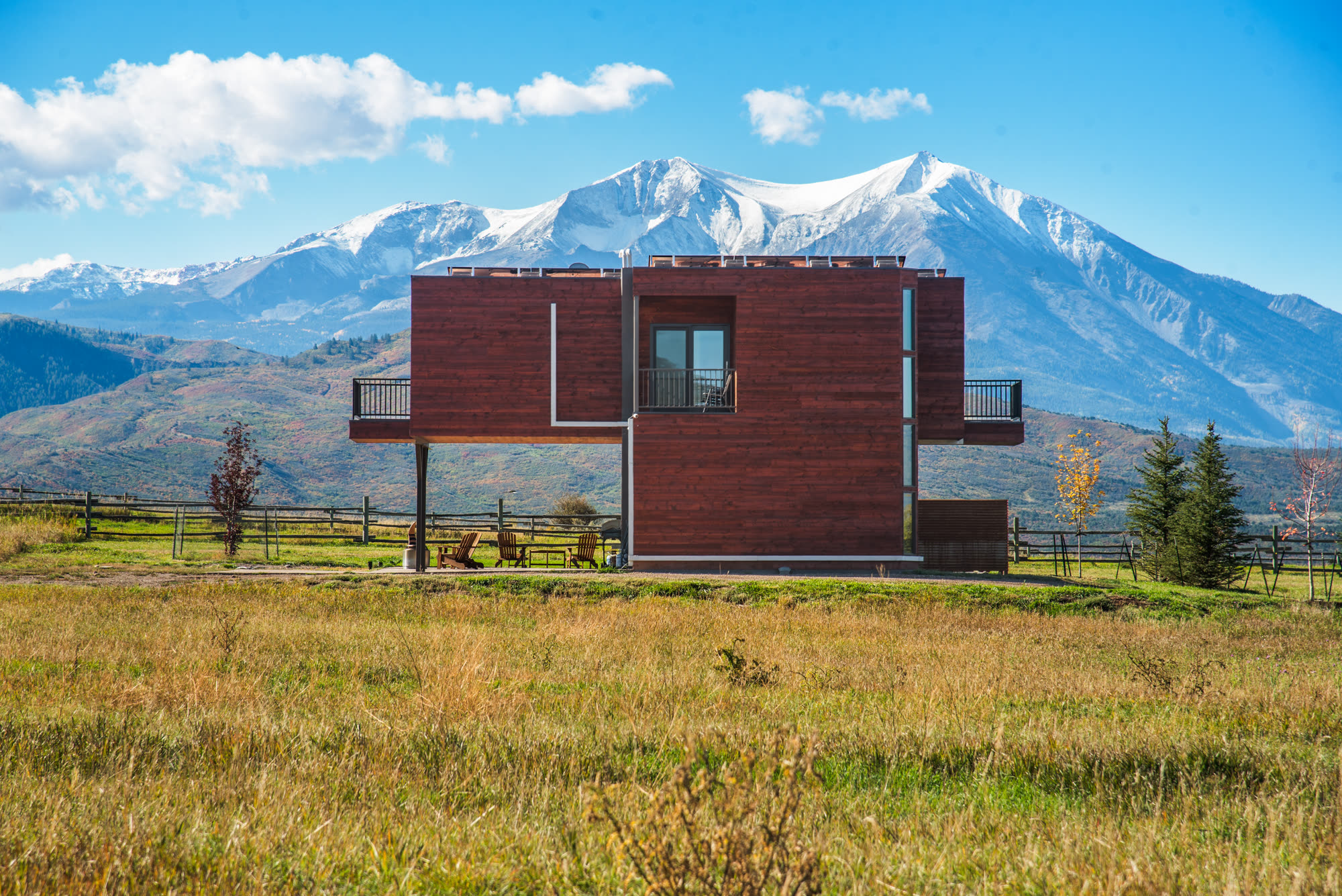 Container home with mountain workspace views