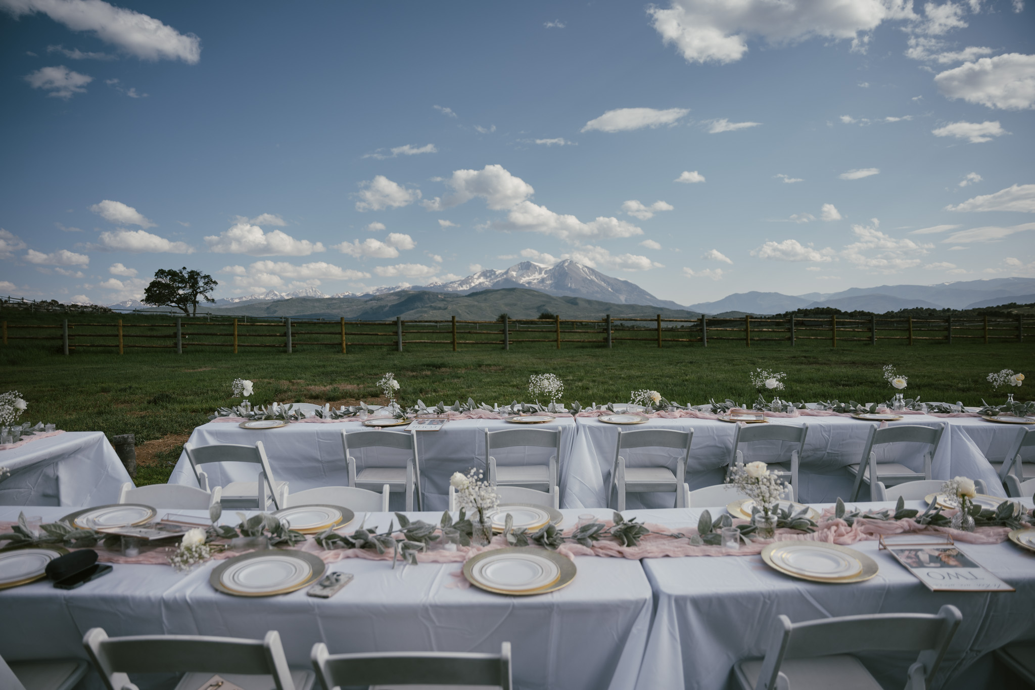 Outdoor table setting at Valinor Ranch with mountain views